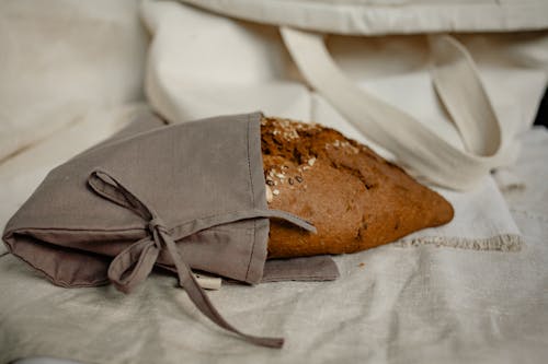 Brown Bread on White Textile