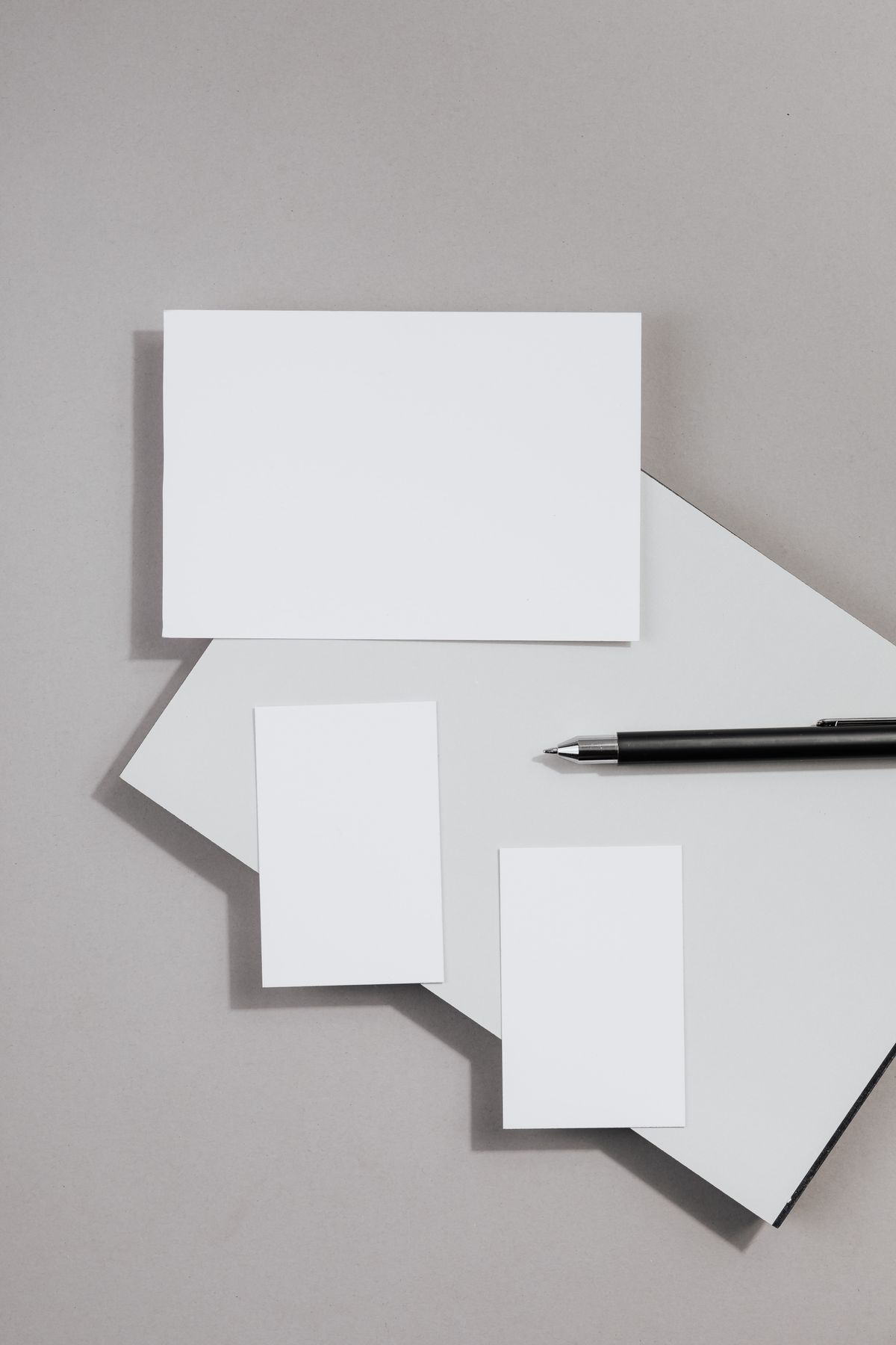 Cards and pen laid out on a desk