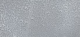 Water Droplets on Glass Panel