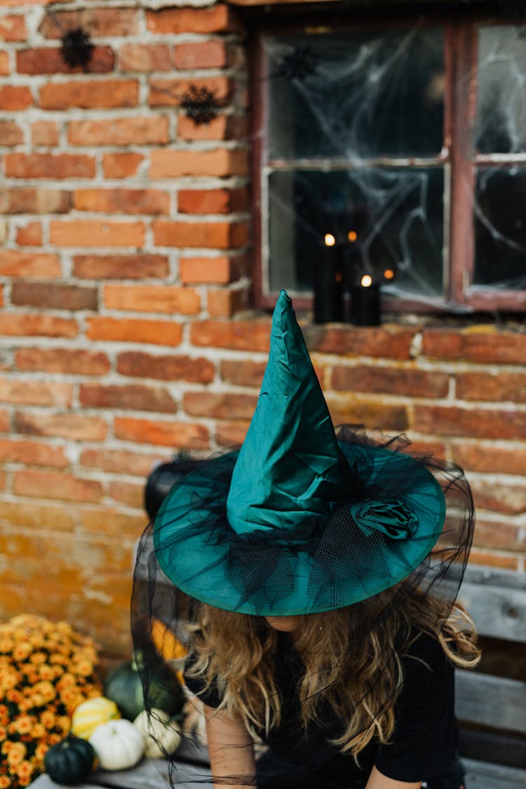 Blonde Girl In Green Wizard Hat