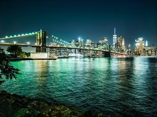 Bridge over Body of Water during Night Time