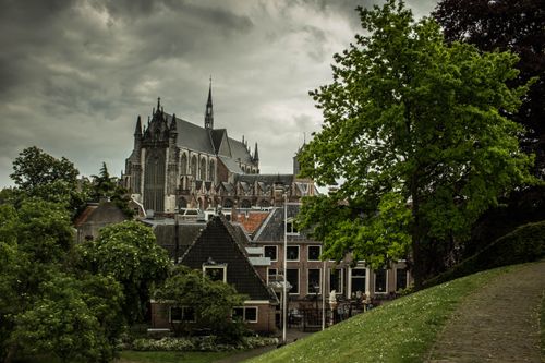 Free Scenic view of Hooglandse Kerk and surrounding historic buildings in Leiden, Netherlands. Stock Photo
