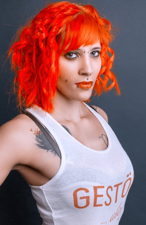Free Woman with Red Hair in White Tank Top Stock Photo