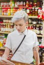 Woman in White Button Up Shirt