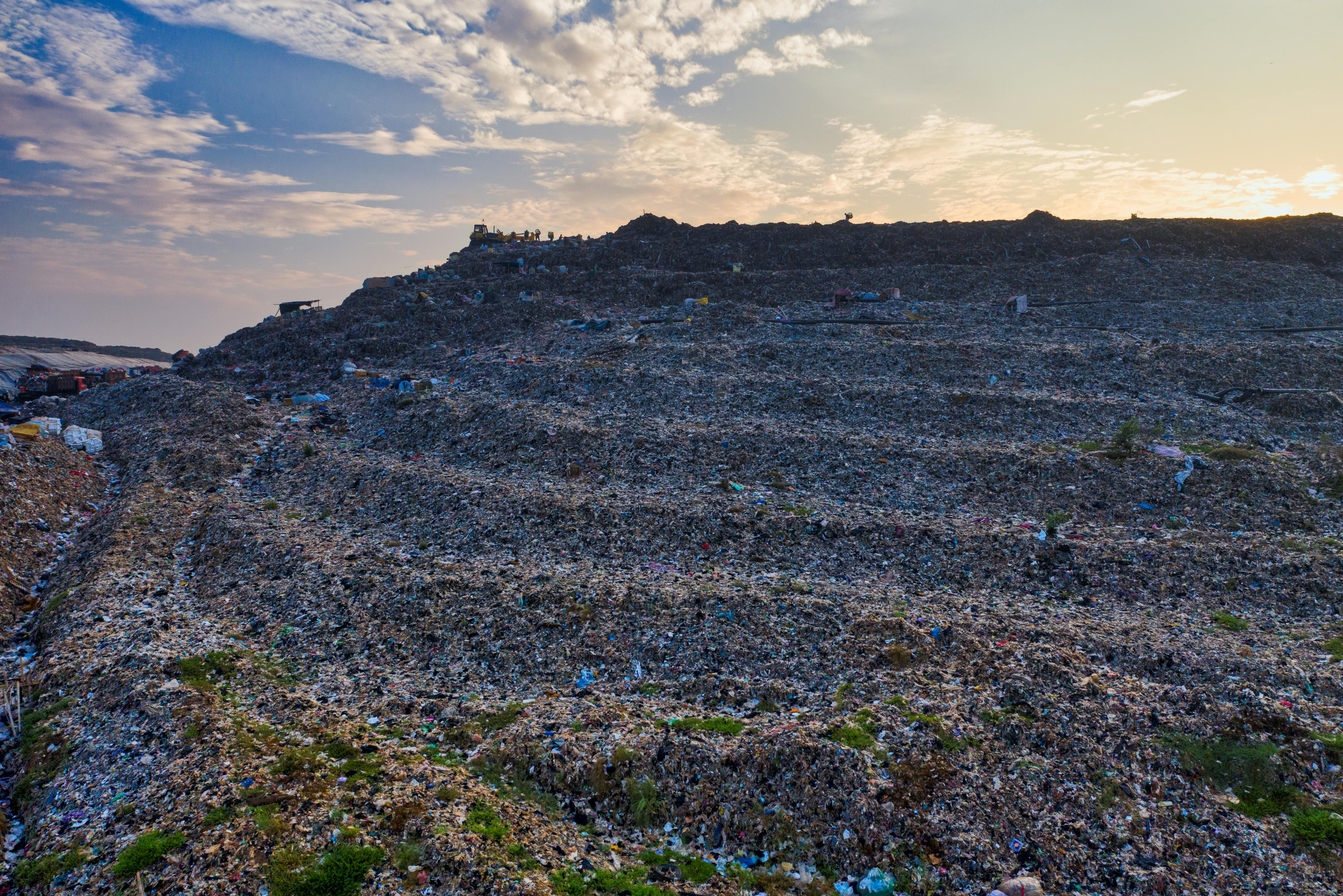 Mountain of Landfill during Dawn · Free Stock Photo