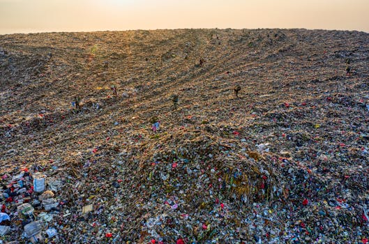 Drone shot of a massive landfill highlighting environmental pollution in West Java, Indonesia.