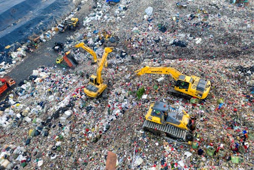 Heavy Equipments on Landfill 