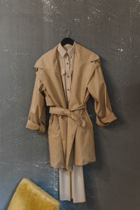 Waxed field coat on a hanger — photo by Arina Krasnikova on Pexels