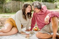 Happy couple enjoying picnic together