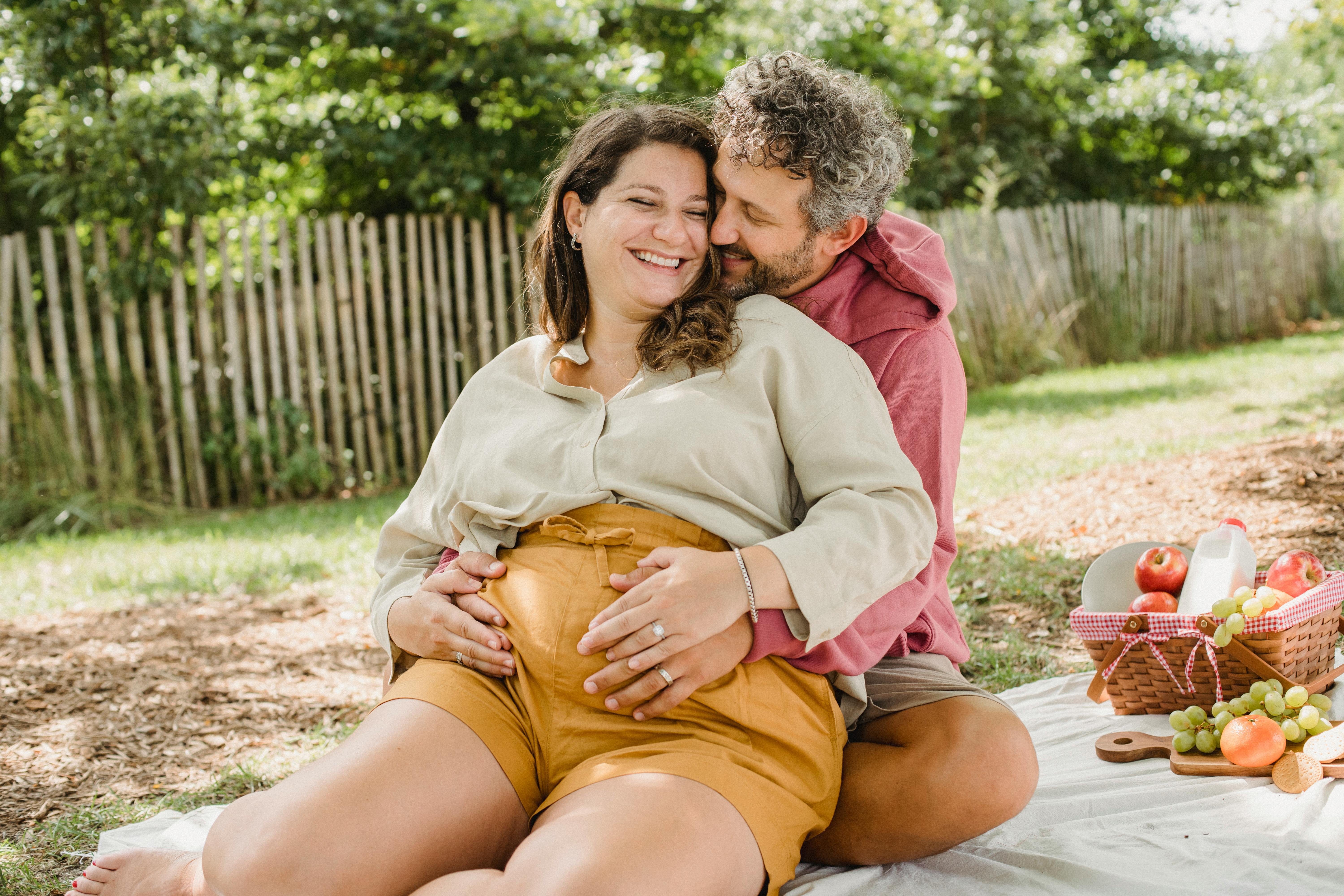 romantic couple embracing during picnic