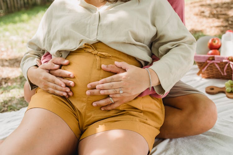 Crop Couple Having Picnic In Park