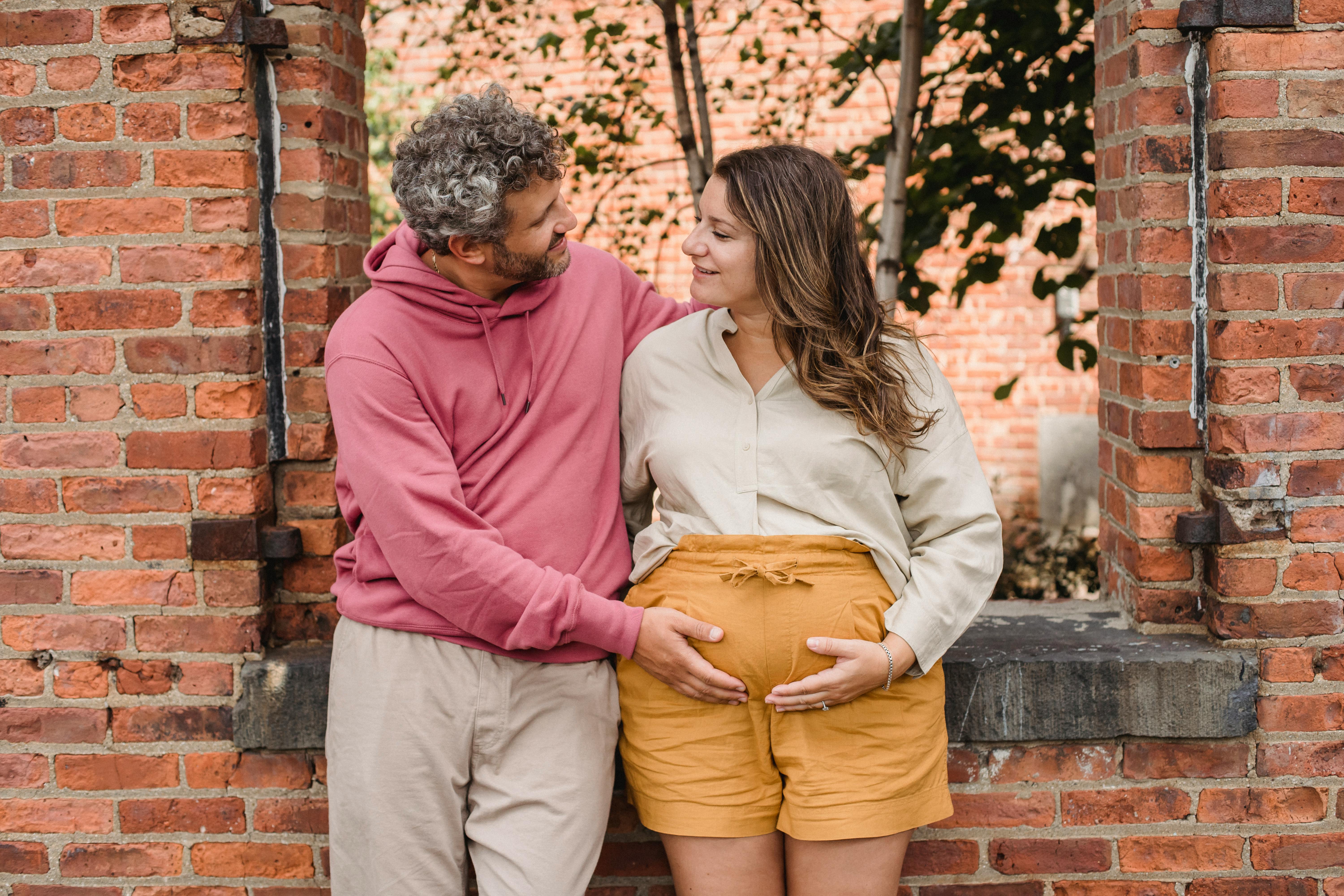 couple in expectancy looking at each other