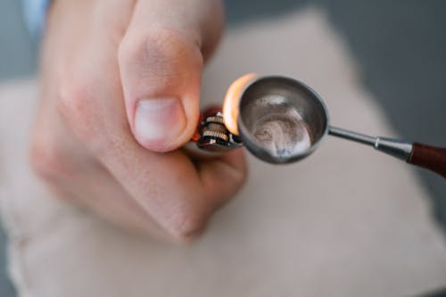Melting of Wax Seal on a Stamping Spoon 