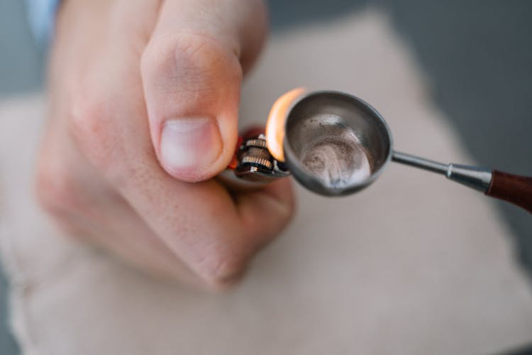 Melting Of Wax Seal On A Stamping Spoon 