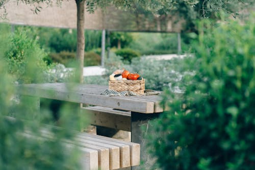 Fresh Vegetables on a Woven Basket on Table Top in Tilt-Shift Lens 