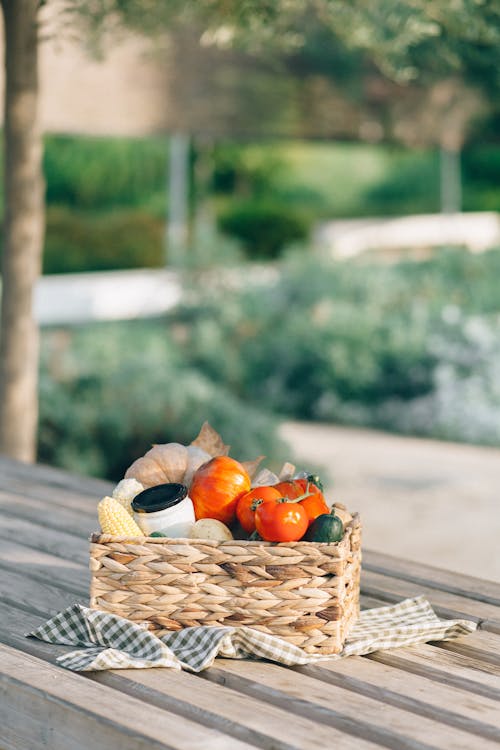 
Fresh Vegetables on a Woven Basket on Table Top