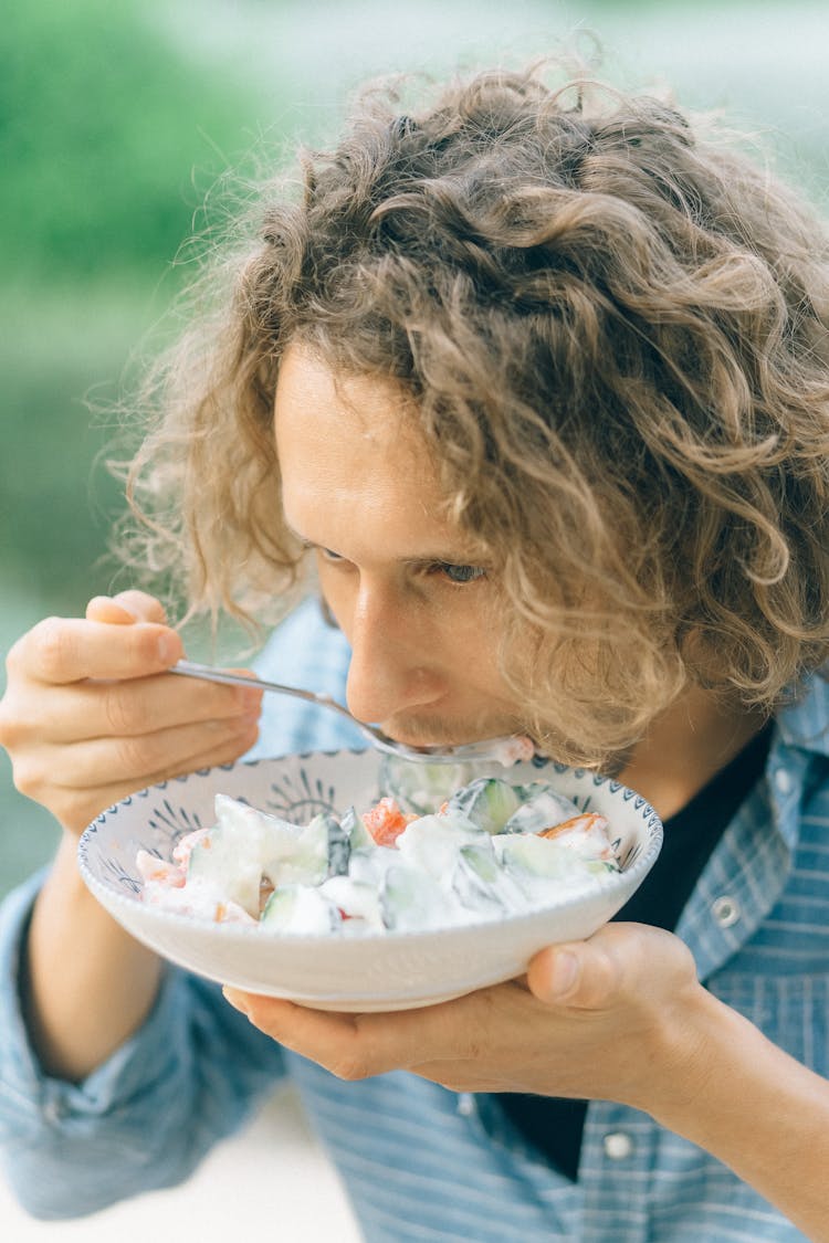 Man Eating Vegetable Salad