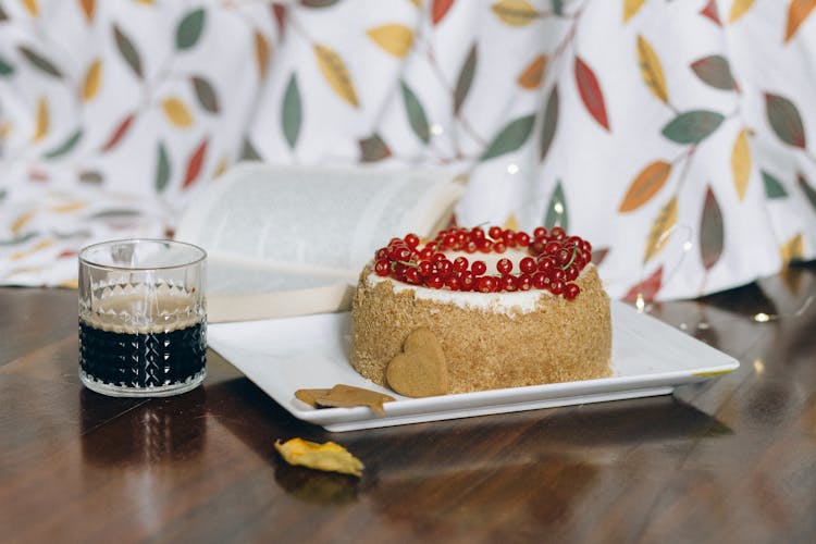 Cake With Red Berries On A Platter