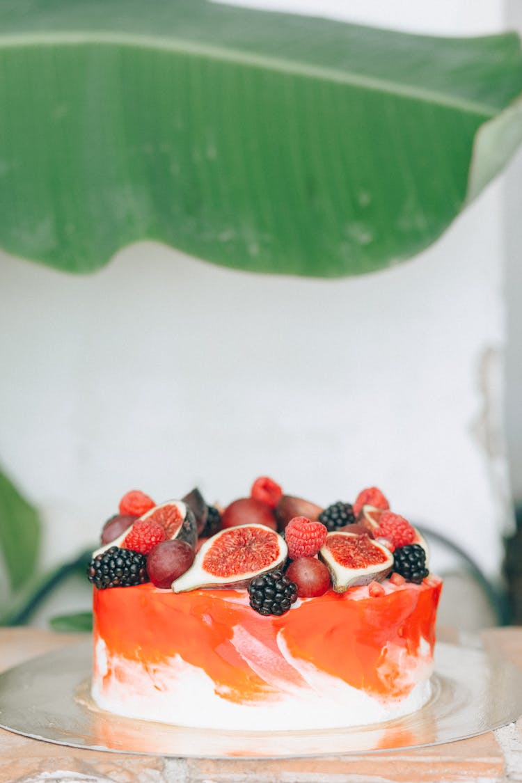 Fruit Cake On A Clear Plate 