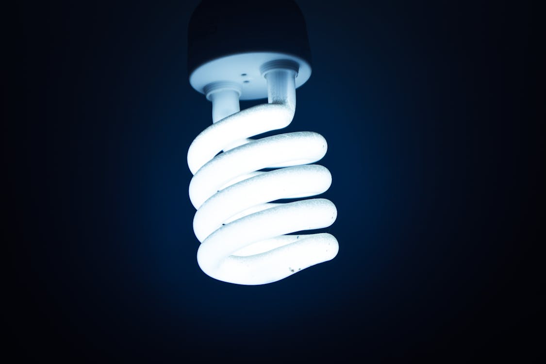 A white LED bulb on a black background