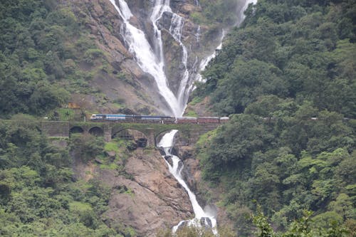 Free stock photo of train, train and water fall, waterfall