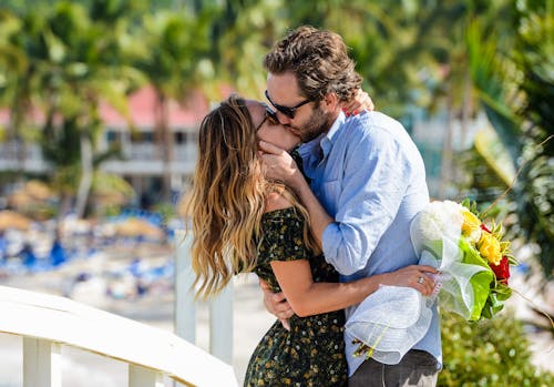 Handsome Man Kissing a Beautiful Woman