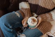 Person Holding White Ceramic Mug With Coffee