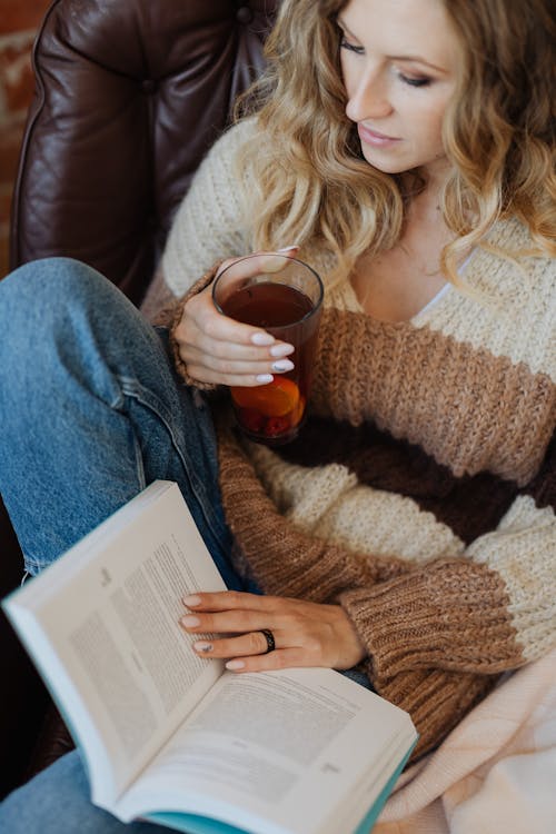 Woman Drinking Tea and Reading