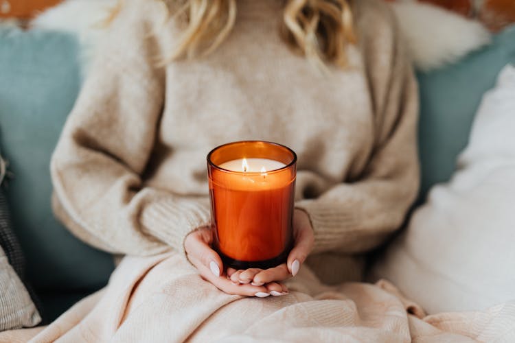 Woman Holding Candle