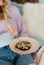 Female Hands with Fork on Cake