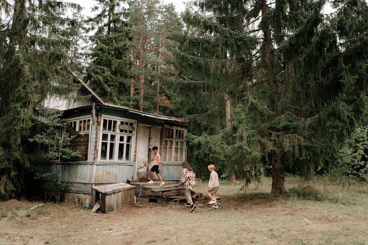 Teens Going Inside The Abandoned House