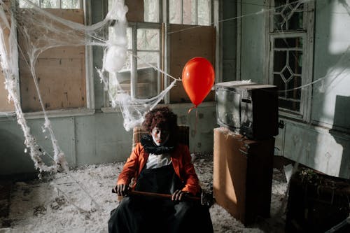 Free Scary Clown in an Abandoned Building Stock Photo