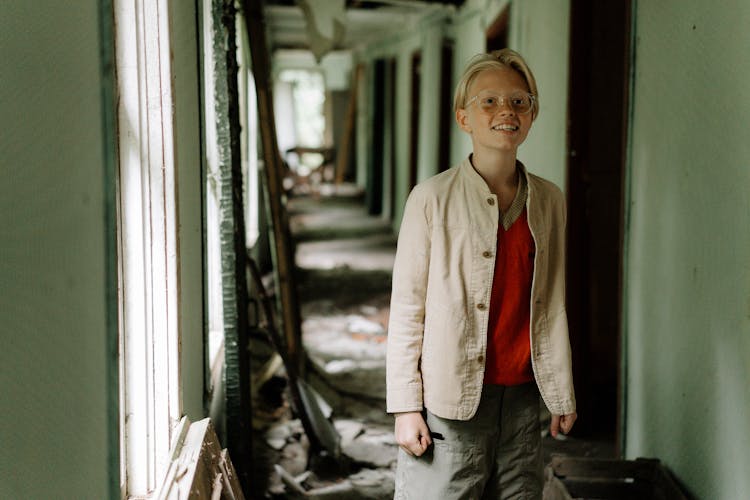 Teen In An Abandoned Hallway 