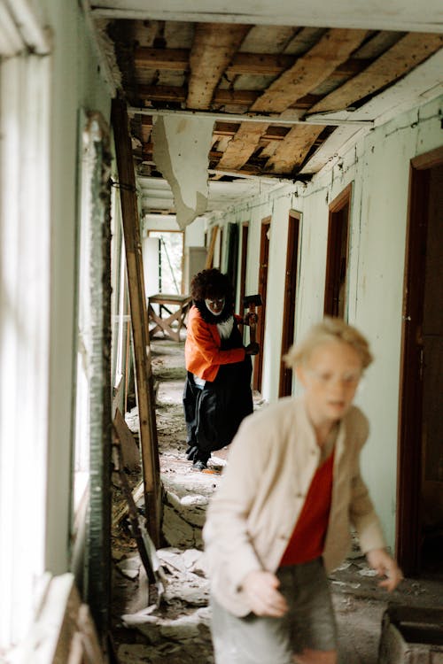 Clown chasing a Terrified Boy on a Hallway