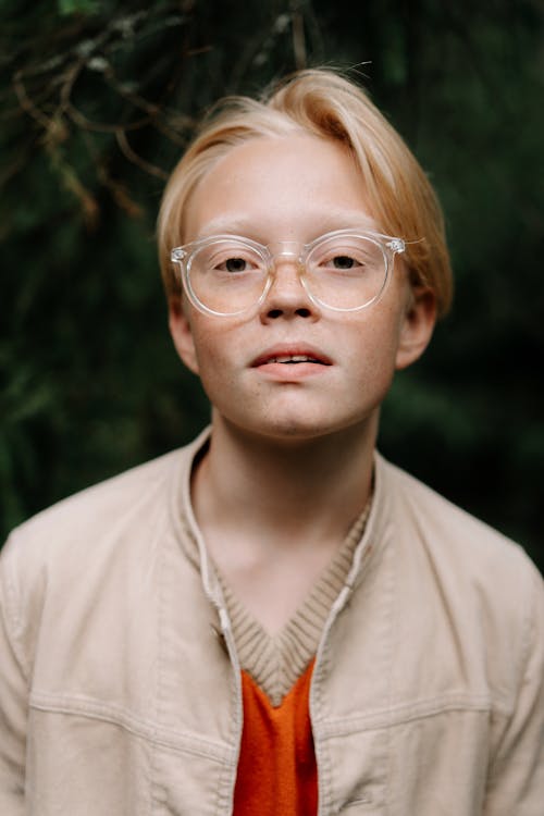Free Close-up Photo of a Teen in Eyeglasses Stock Photo