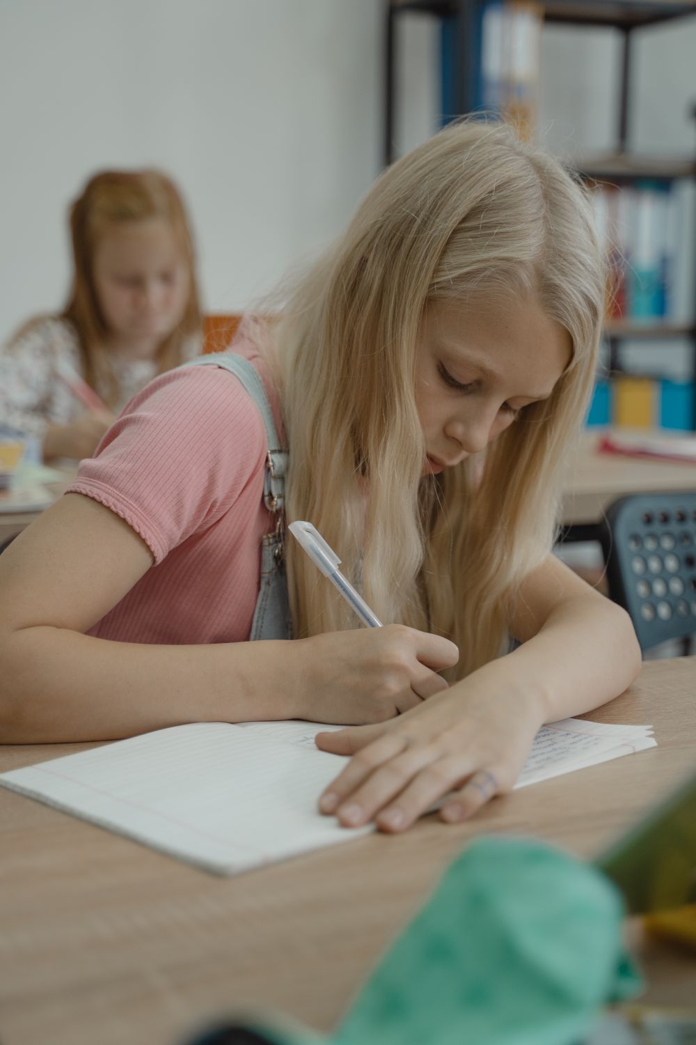 Writing Girl Girl Writing on Notebook · Free Stock Photo