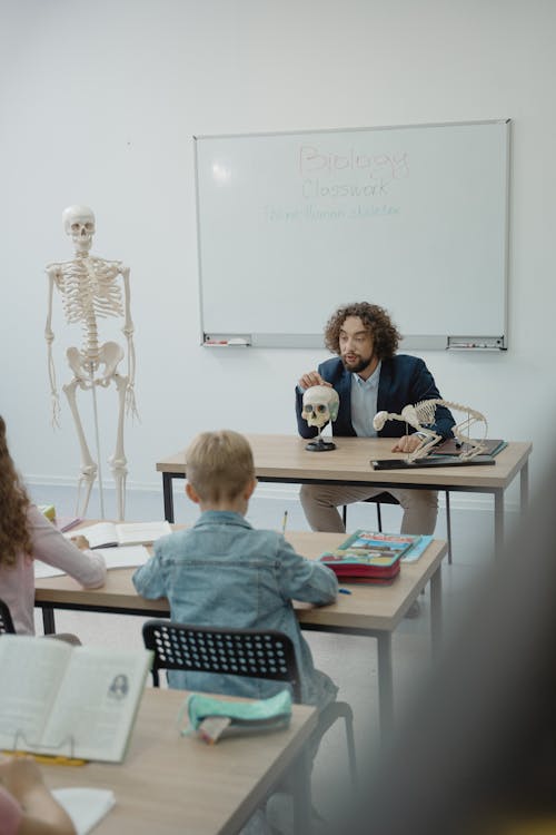 Teacher Teaching Human Anatomy in Class