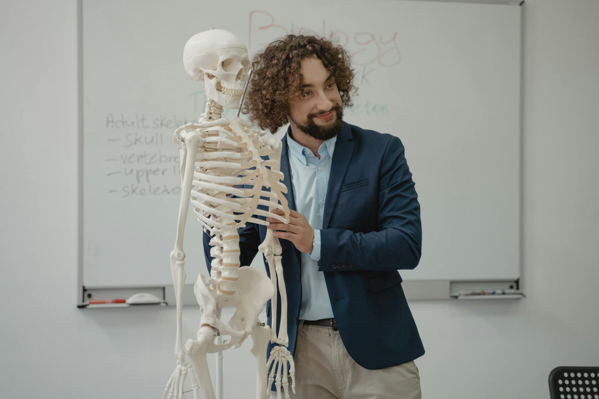 A Man Teaching Biology in a Class