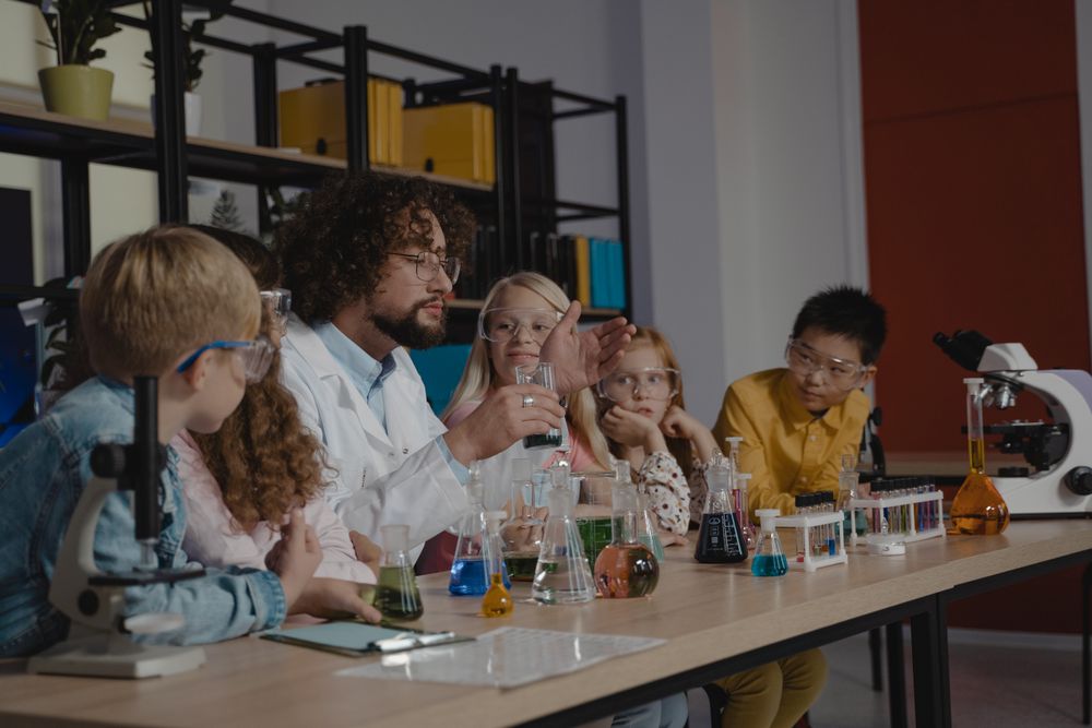 A teacher doing science experiments with students in class