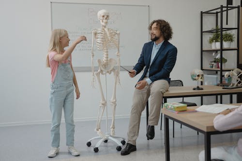 Teacher teaching Biology on a Student 