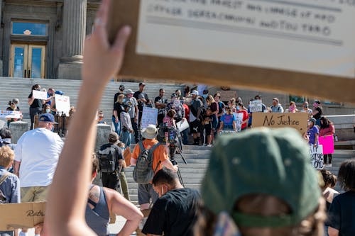 Free Protesting people standing on stairs Stock Photo
