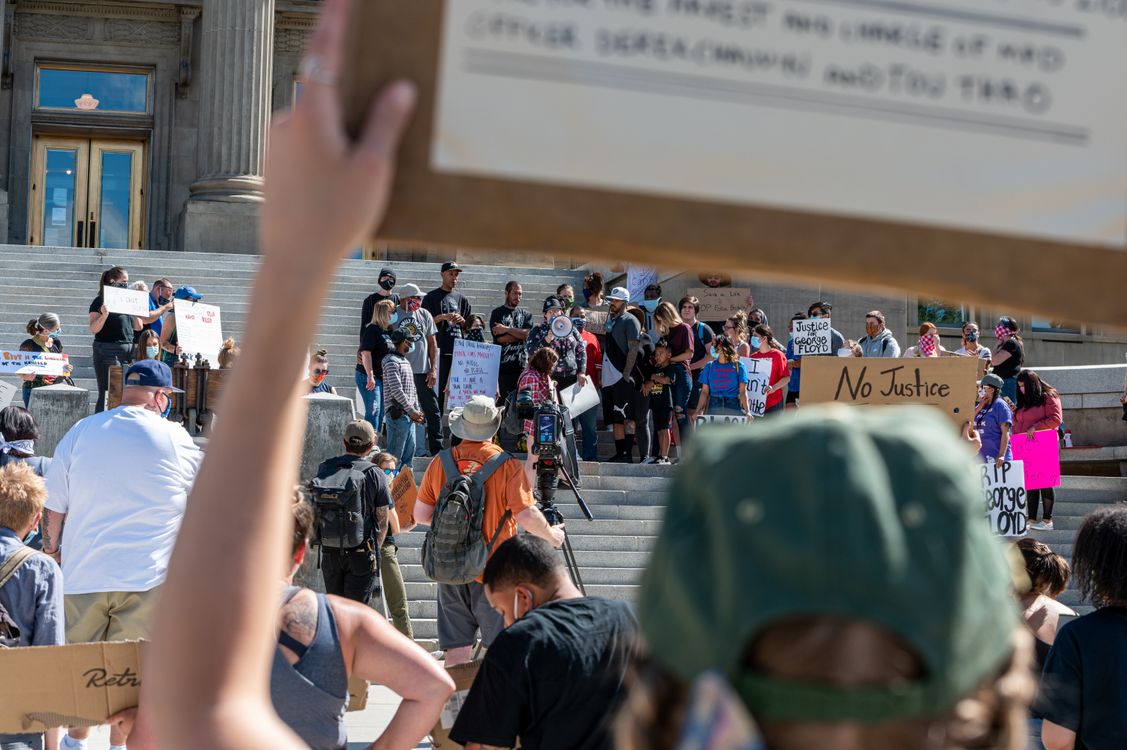Protesting people standing on stairs · Free Stock Photo