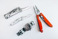 Silver and Red Hand Tool
