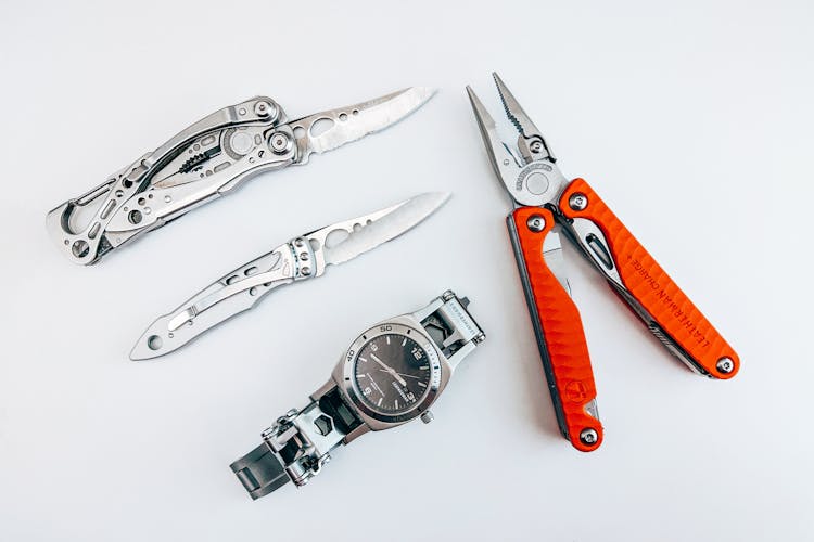 Watch, Pincers And Pocket Knives