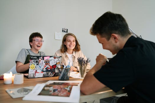 Young professionals collaborating and brainstorming ideas in a relaxed office setting.