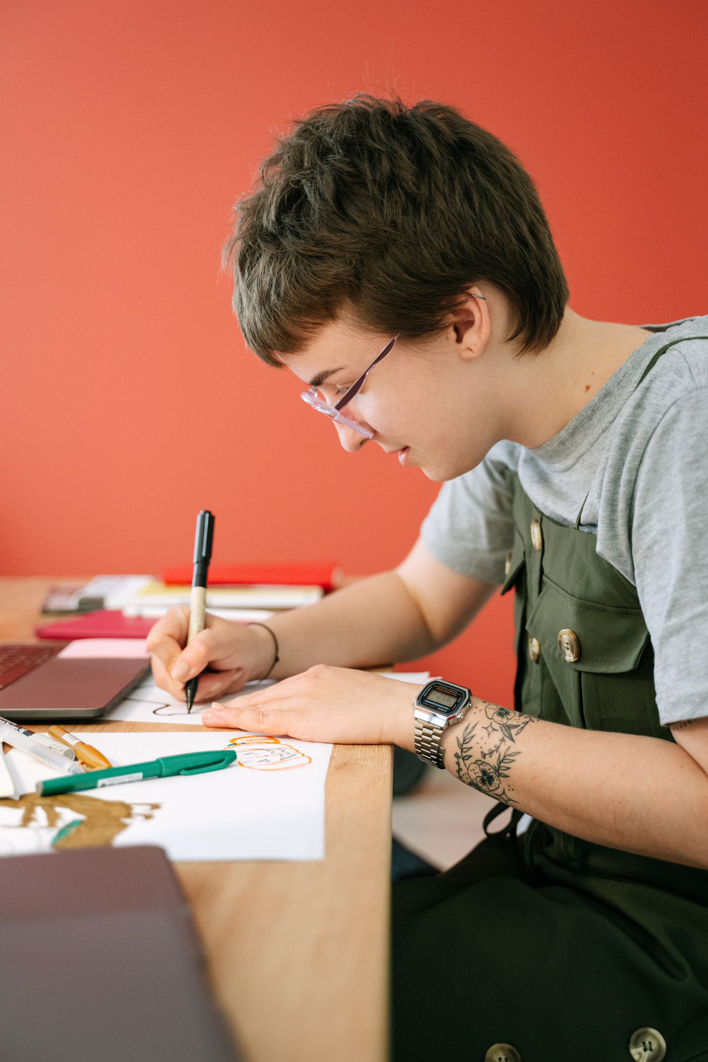 Designer sketching and developing a creative identity