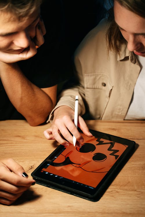 Free Drawing a Halloween Illustration on a Tablet Stock Photo