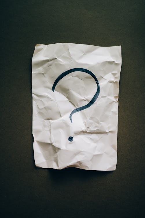 Free Question Mark on Crumpled Paper Stock Photo