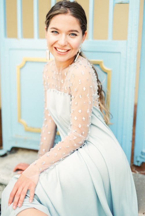 Elegant Woman in Light Blue Dress