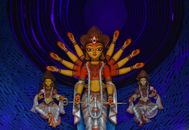 Hindu Deity Figurine on Purple Textile